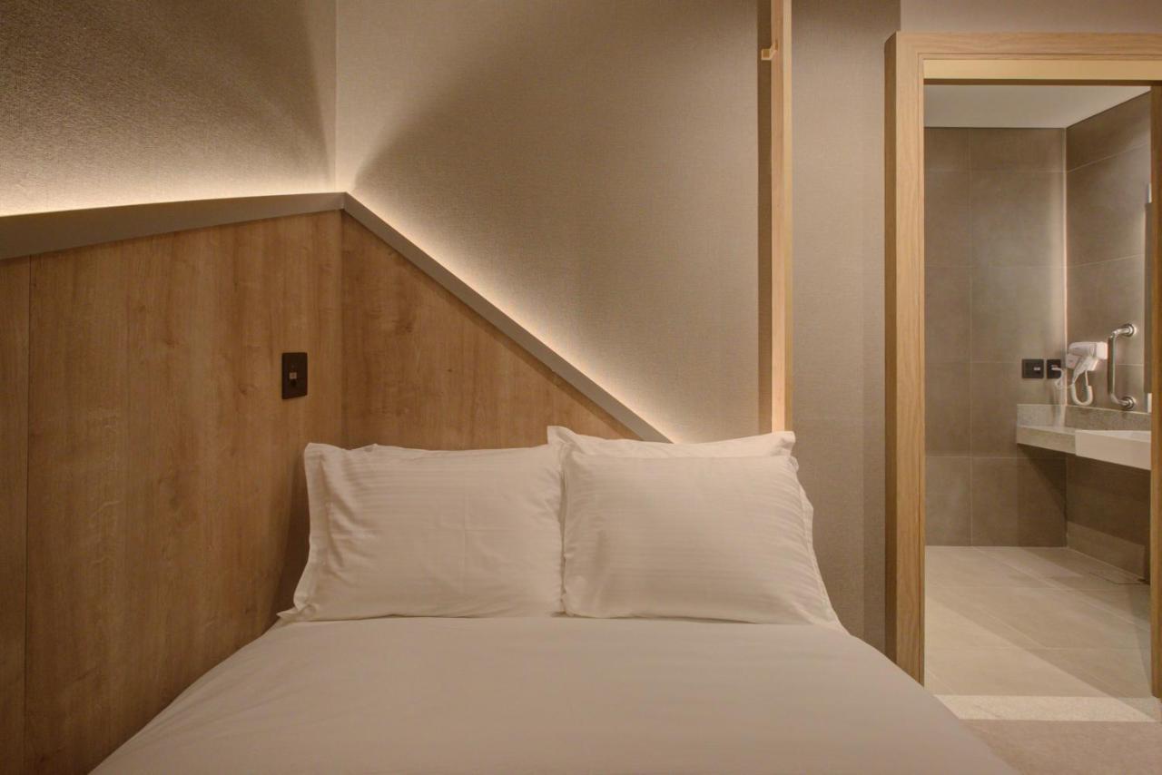 Fast Sleep Suites By Slaviero Hoteis - Hotel Dentro Do Aeroporto De Guarulhos - Terminal 2 - Desembarque Oeste Exterior foto